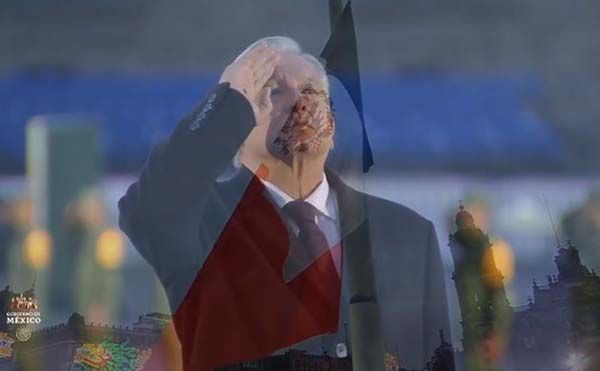 AMLO iza bandera en memoria de las víctimas de los sismos